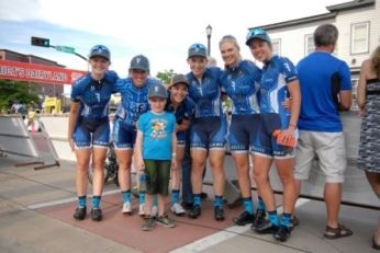 women cyclists posing at Fearless Femme event